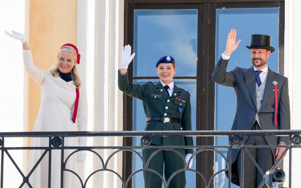 Princess Ingrid Alexandra of Norway, who is taking part in her country's military service programme, photographed with her parents earlier this month