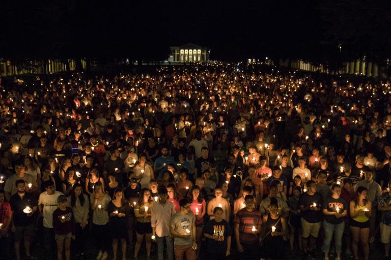 Thousands gathered for poignant candlelit vigil in response to Charlottesville violence on Wednesday night