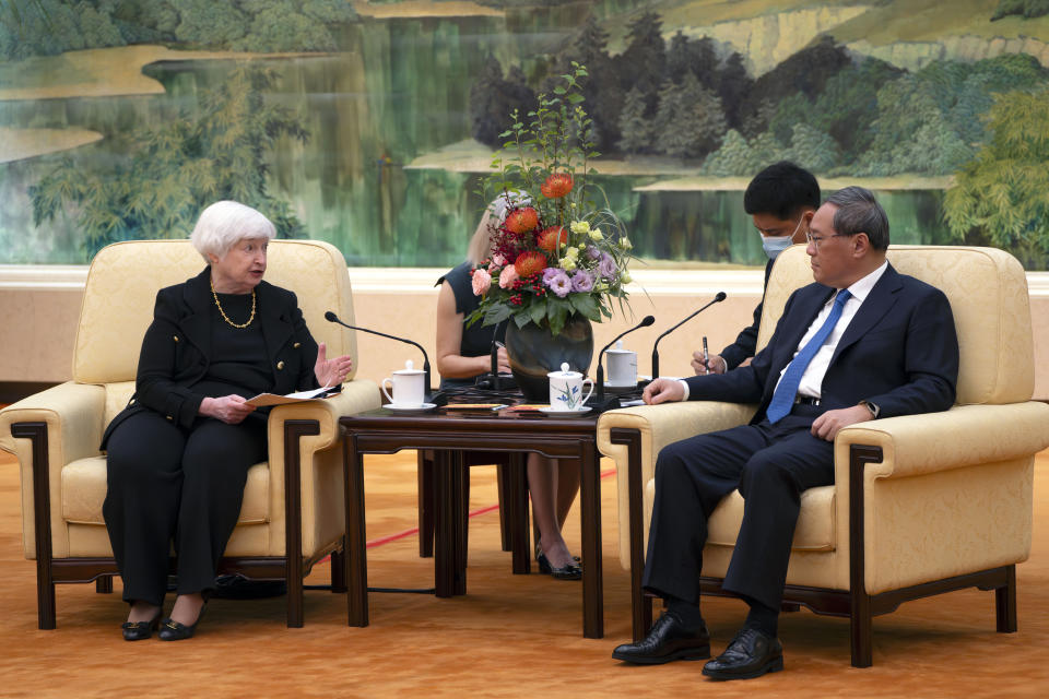 Treasury Secretary Janet Yellen, left, speaks as Chinese Premier Li Qiang, right, listens during a meeting at the Great Hall of the People in Beijing, China, Friday, July 7, 2023. (AP Photo/Mark Schiefelbein, Pool)