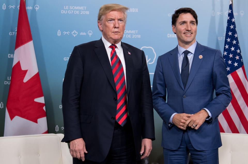 US President Donald Trump and Canadian Prime Minister Justin Trudeau hold a meeting on the sidelines of the G7 Summit in La Malbaie, Quebec, Canada, June 8, 2018. (Photo by SAUL LOEB / AFP)