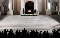 <p>As night fell, individuals gathered to pay their respects and mourn the Civil Rights icon. </p>