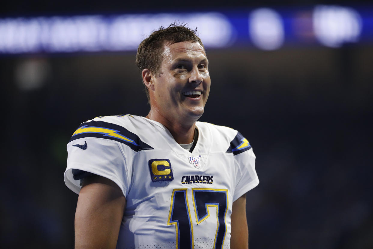 Los Angeles Chargers quarterback Philip Rivers (17) smiles against the Detroit Lions in the first half of an NFL football game in Detroit, Sunday, Sept. 15, 2019. (AP Photo/Rick Osentoski)