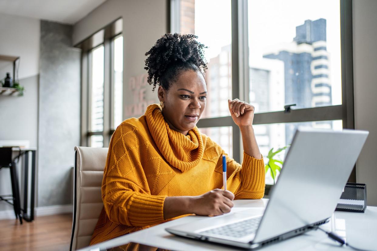 Black woman working from home office