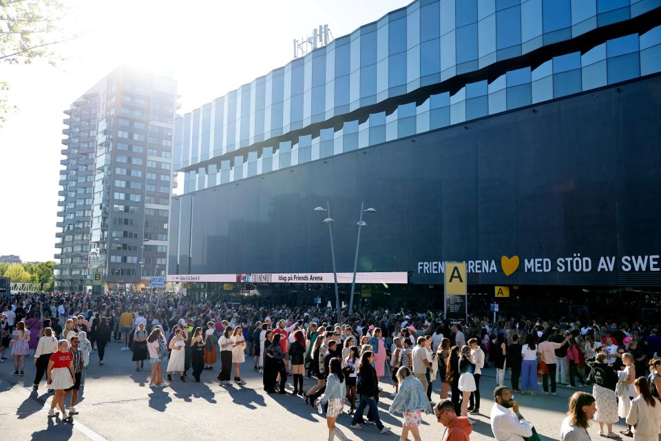 Fans line up outside the Friends arena ahead of US singer-songwriter Taylor Swift's concert of her Eras Tour in Stockholm, Sweden on May 17, 2024.