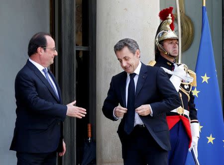 File photo of French President Francois Hollande (L) who welcomed Nicolas Sarkozy, head of France's Les Republicains political party and former French president, as the two meet after Britain's vote to leave the European Union, at the Elysee Palace in Paris, France, June 25, 2016. REUTERS/Jacky Naegelen/File Photo