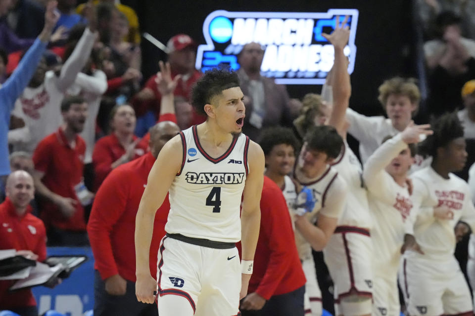 Dayton guard Koby Brea (4) celebrates after scoring a 3-pointer against Nevada during the second half of a first-round college basketball game in the NCAA Tournament in Salt Lake City, Thursday, March 21, 2024. (AP Photo/Rick Bowmer)