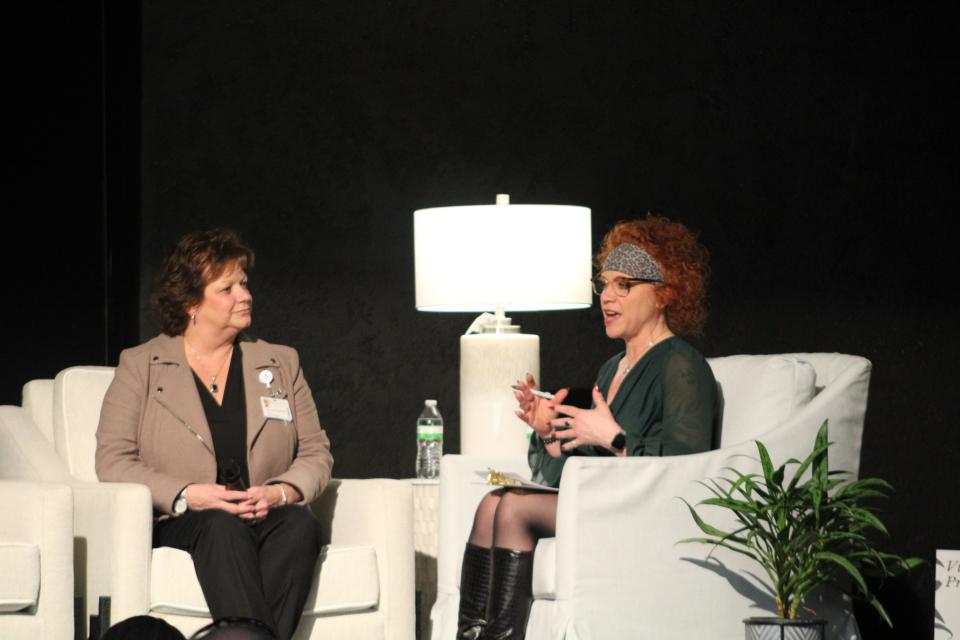 Joanne Schroeder (left), president and CEO at Munson Hospital Charlevoix, talked with chamber president Nikki Devitt about Munson's expansion efforts during the Petoskey Area Regional Chamber of Commerce's State of the Community on Feb. 23, 2024.