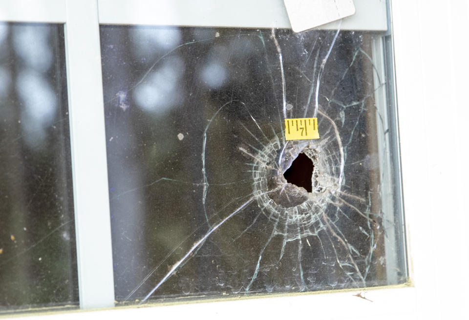 A bullet hole in the glass of a window at the Murdaugh family property in Islandton on March 1, 2023