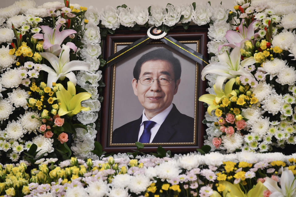 In this photo provided by Seoul Metropolitan Government, a portrait of the deceased Seoul Mayor Park Won-soon is placed at a hospital in Seoul, South Korea, Friday, July 10, 2020. Seoul's mayor left a note saying he felt "sorry to all people" before he was found dead early Friday, officials in the South Korean capital said as people began mourning the liberal legal activist seen as a potential presidential candidate. (Seoul Metropolitan Government via AP)