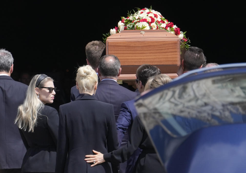 The coffin containing the body of media mogul and former Italian Premier Silvio Berlusconi is followed by, from left, his daughter Barbara, partner Marta Fascina, son Pier Silvio, and daughter Marina inside Milan's Gothic Cathedral for of his state funeral in northern Italy, Wednesday, June 14, 2023. Berlusconi died at the age of 86 on Monday in a Milan hospital where he was being treated for chronic leukemia. (AP Photo/Luca Bruno)