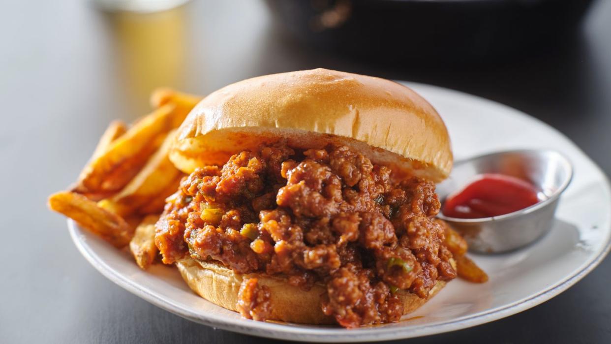 close up of burger in plate on table