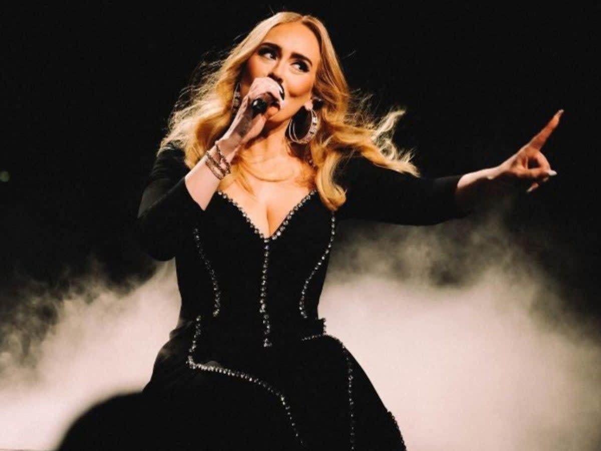 Adele performing at her Las Vegas residency show while wearing a custom Stella McCartney gown (Raven B Varona/Stella McCartney)