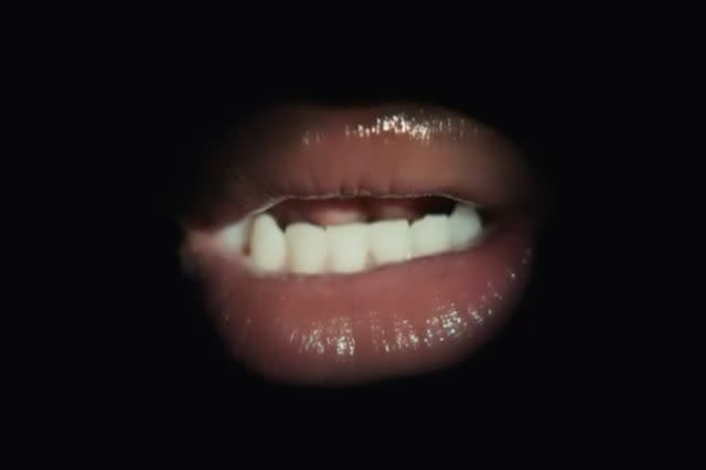 <p>Megan Thee Stallion/ Instagram</p> Megan Thee Stallion teases new project showing off her lips and fangs in new Instagram video
