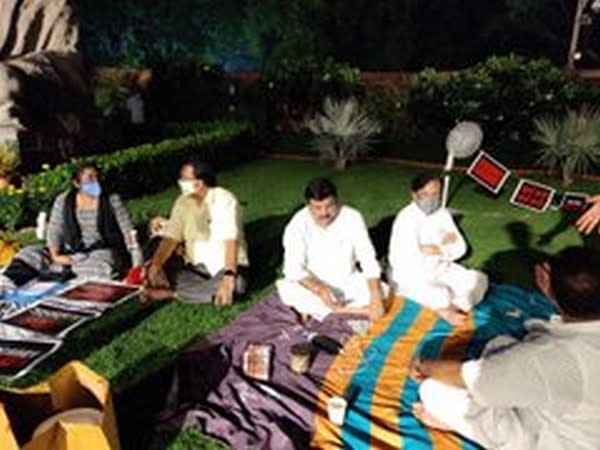 The eight suspended MPs spending the night on Parliament lawn (Photo source: Ripun Bora's Twitter)
