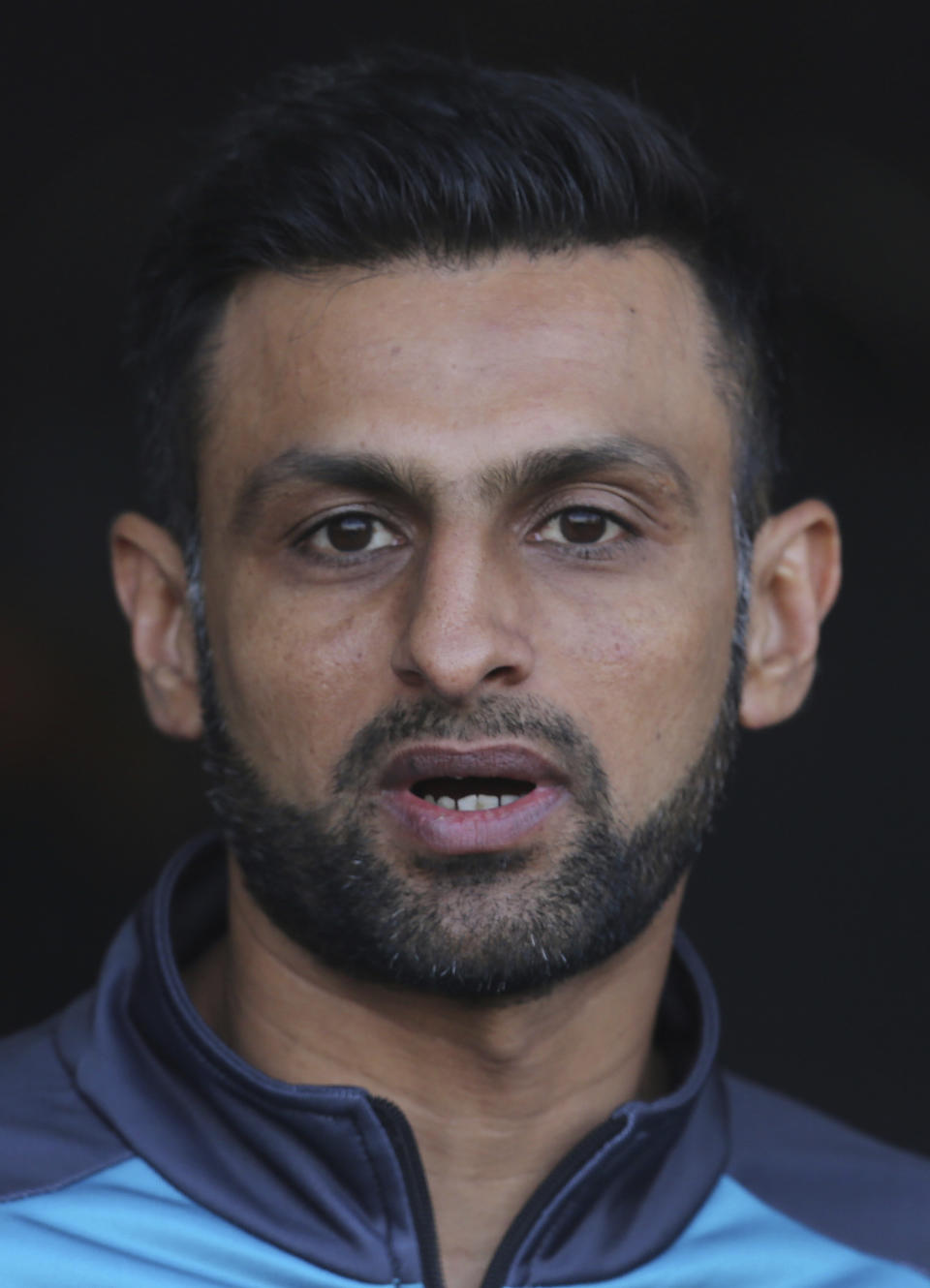 Pakistan allrounder Shoaib Malik gestures addresses a press conference in Lahore, Pakistan, Wednesday Jan. 22, 2020. Malik said he wants to focus on the home Twenty20 series against Bangladesh, starting from Friday instead of focussing on T20 World Cup later this year. (AP Photo/K.M. Chaudary)