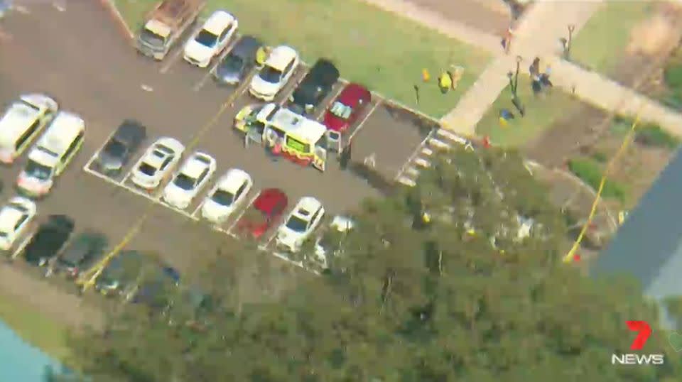 Police, firefighters and paramedics could be seen attending the crash scene at the Greenacre school. Source: 7 News