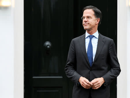 FILE PHOTO: Dutch Prime Minister Mark Rutte waits for European Council President Donald Tusk to meet for talks ahead of next week's EU summit, when leaders will discuss Britain's plans to leave the trading bloc, in The Hague, Netherlands March 15, 2019. REUTERS/Piroschka van de Wouw