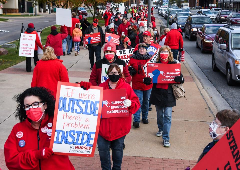 Sparrow Healthcare staff and other supporters demonstrate outside Sparrow Hospital in Lansing afternoon, Wednesday, Nov. 3, 2021.