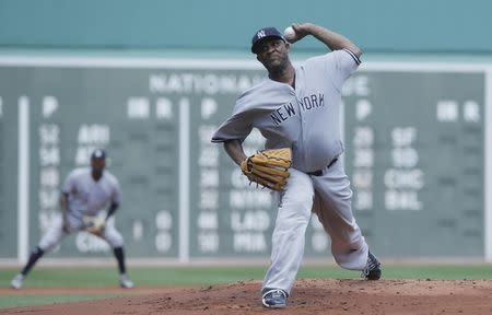 Jul 16, 2017; Boston, MA, USA; New York Yankees starting pitcher CC Sabathia (52) throws the ball against the Boston Red Sox in the first inning at Fenway Park. Mandatory Credit: David Butler II-USA TODAY Sports