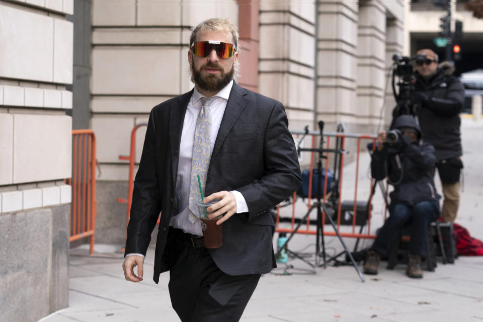 Anthime "Baked Alaska" Gionet, who livestreamed himself storming the U.S. Capitol in Jan. 6, arrives at federal court to be sentenced, in Washington, Tuesday, Jan. 10, 2023. (AP Photo/Jose Luis Magana)