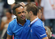 Croatia Tennis - Croatia v France - Davis Cup Semi Final - Kresimir Cosic Hall, Zadar, Croatia - 16/9/16 France's coach Yannick Noah (L) react after Richard Gasquet win the singles match against Croatia's Borna Coric. REUTERS/Antonio Bronic