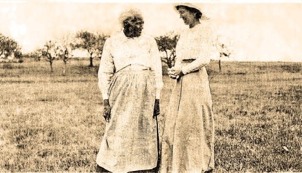 Charlotte Watson is pictured, left, in a photo taken around 1900, with Margaret Jane Menzie on Menzie Road in Kings County. (Submitted by Barb Pearce - image credit)