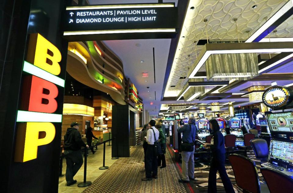 Work continues in Horseshoe Casino Cincinnati, Tuesday, Feb. 26, 2013, in Cincinnati. The casino set to open to the public Monday, March 4, has several restaurants inside including Bobby Flay's Burger Palace. (AP Photo/Al Behrman)