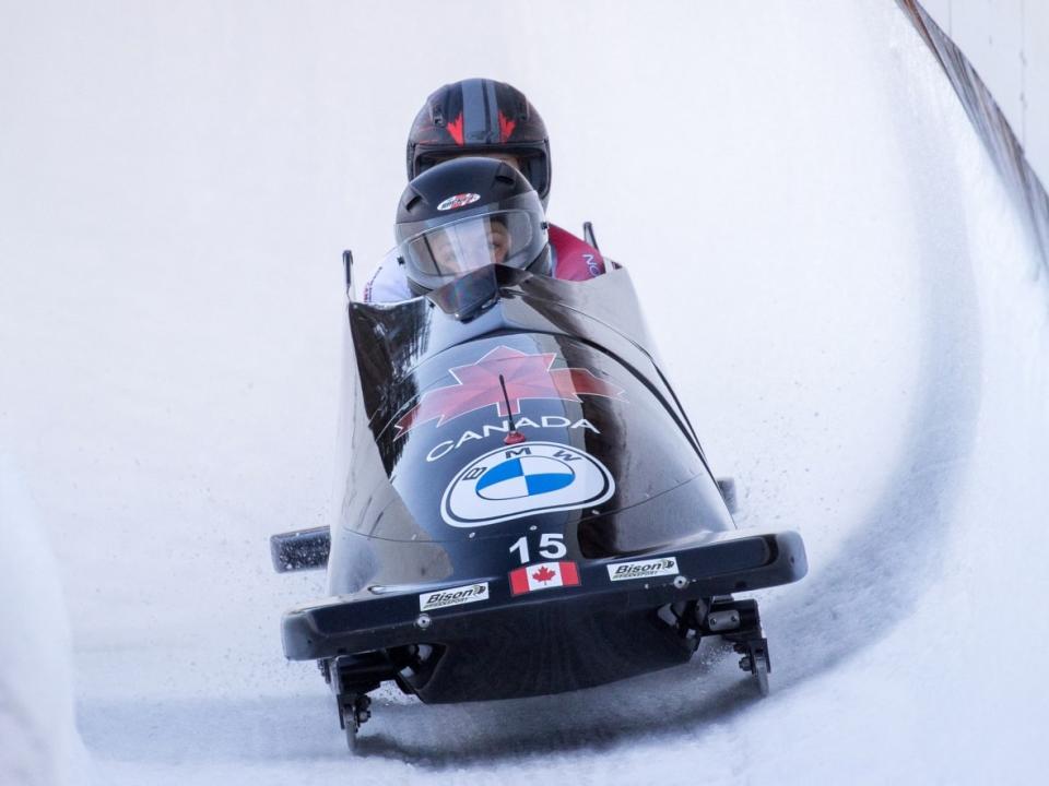 Canada's Christine de Bruin and Kristen Bujnowski once again landed on the World Cup podium, takimng bronze on Sunday in Igls, Austria. (EXPA/AFP via Getty Images - image credit)