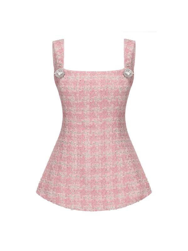 <p>Nana Jacqueline Anabella Bow Top, $360, <a href="https://nanajacqueline.com/collections/pre-fall-2024/products/anabella-bow-top-pink-checkered" rel="nofollow noopener" target="_blank" data-ylk="slk:available here;elm:context_link;itc:0;sec:content-canvas" class="link ">available here</a></p>