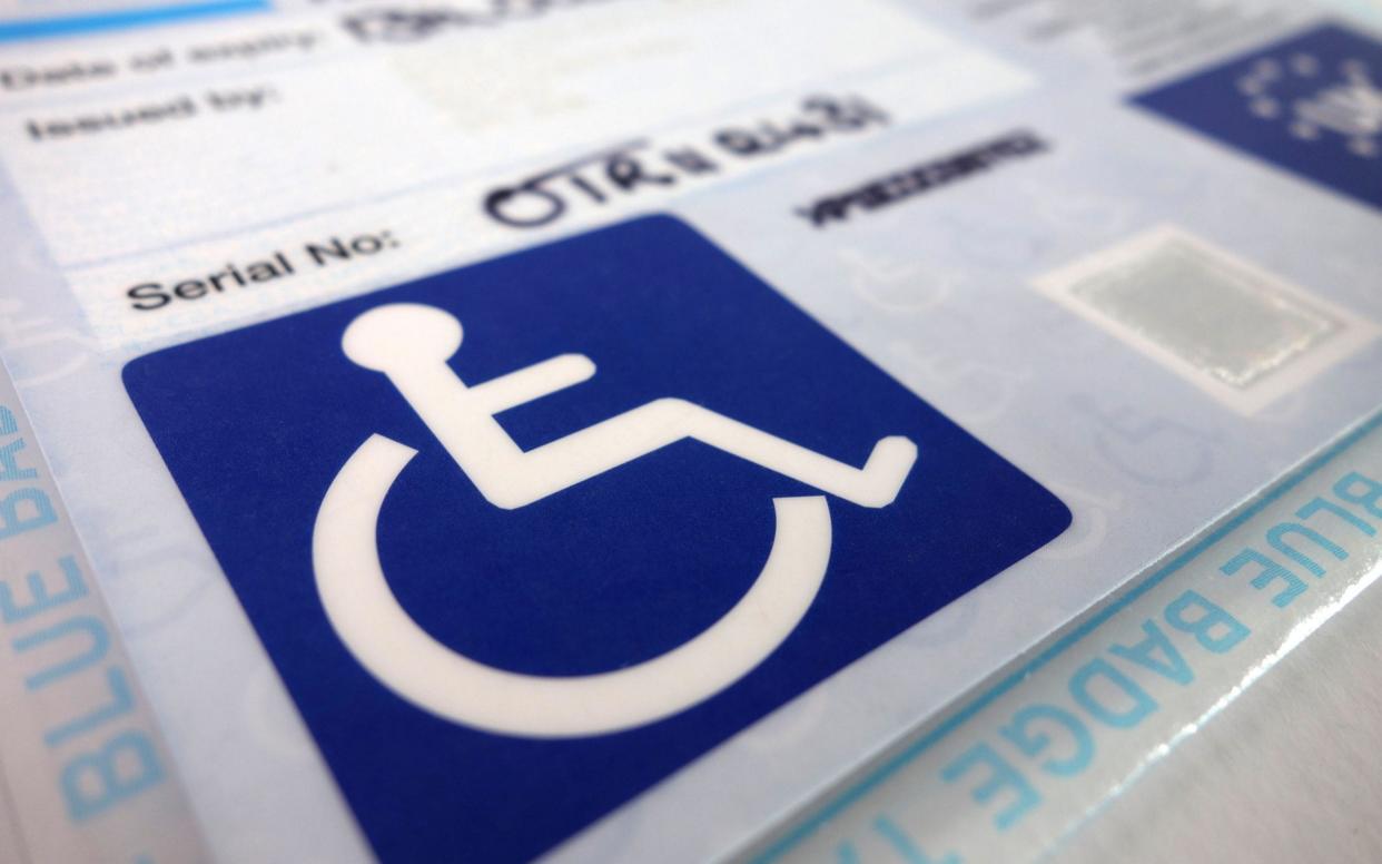 A disability blue badge -  Kevin Britland / Alamy Stock Photo/https://www.alamy.com