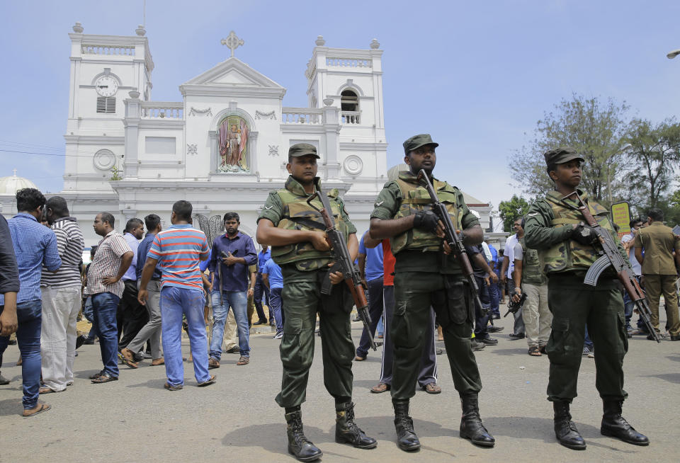 Sri Lankan Army soldiers secure the area around St Anthony's Shrine after a blast in Colombo, Sri Lanka, Sunday, April 21, 2019. A Sri Lanka hospital spokesman says several blasts on Easter Sunday have killed dozens of people. (AP Photo/Eranga Jayawardena)