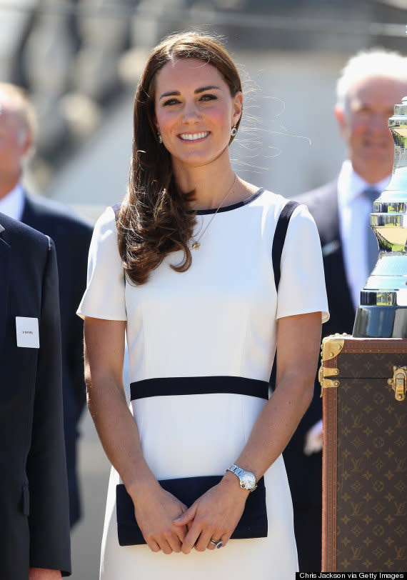 Kate kept things simple in a white Jaeger dress as she attended a breakfast reception in London in October 2014.