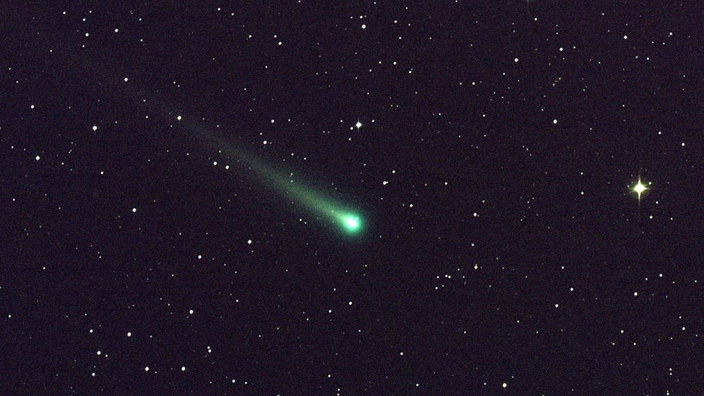  Some comets appear to glow green when ultraviolet sunlight vaporizes carbon molecules in the comet's head  