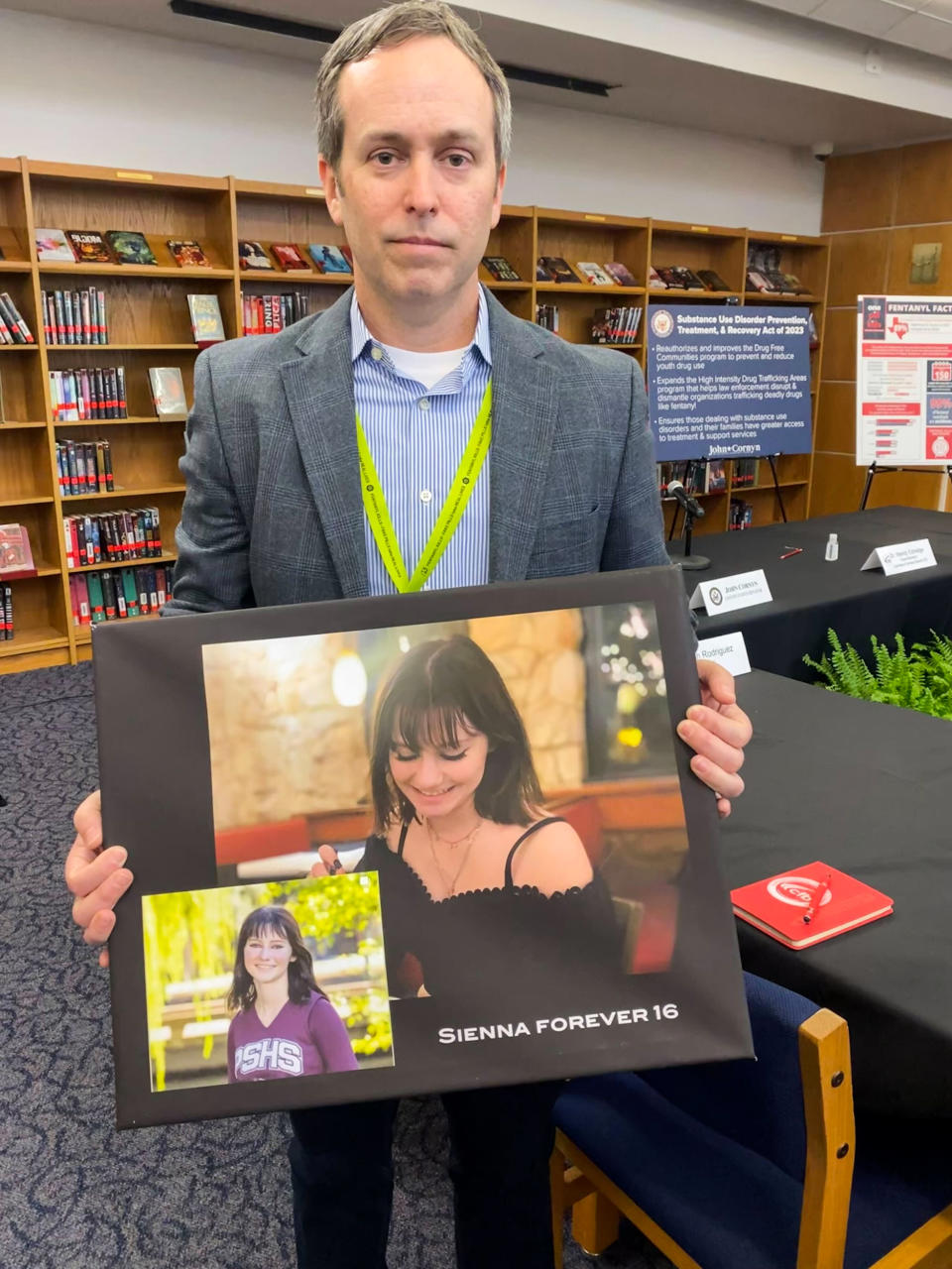 Ryan Vaughn holds photos of his daughter Sienna Vaughn who died from fentanyl poisoning on Feb. 19. (Daniella Silva / NBC News)