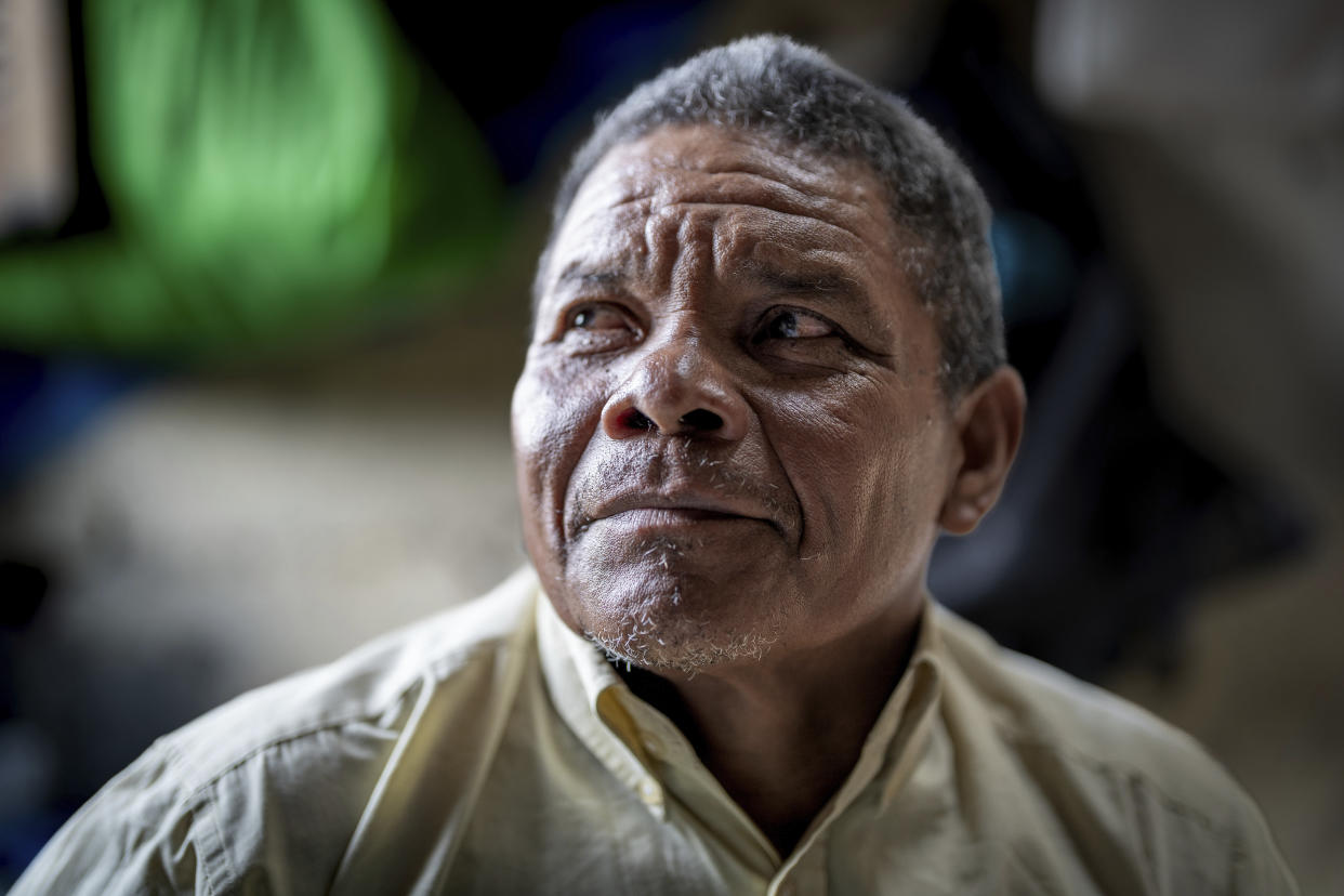 Nicaraguan exile Francisco Alvicio, a deacon of Nicaragua's Moravian Church, poses for a photo in his rented room in San Jose, Costa Rica, Sunday, Sept. 22, 2024. (AP Photo/Carlos Herrera)