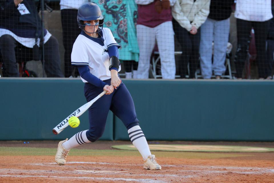 Southmoore's Karissa Reddout drives in the game-winning run during the Class 6A fastpitch softball state tournament championship game between Southmoore and Edmond Memorial at Marita Hynes field in Norman, Okla., Saturday, Oct. 14, 2023. Southmoore won 2-1.