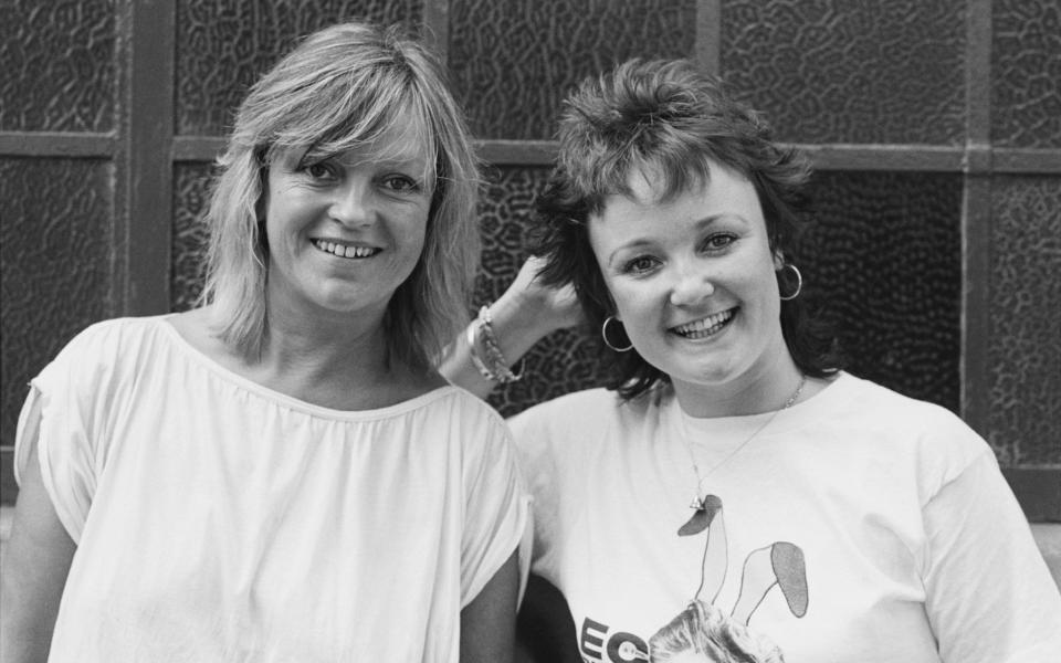 Annie Nightingale (left) and Janice Long posed together at a press event to launch the BBC television 'Rock Around the Clock' 15 hour music schedule in London on 15th August 1983 - Popperfoto 
