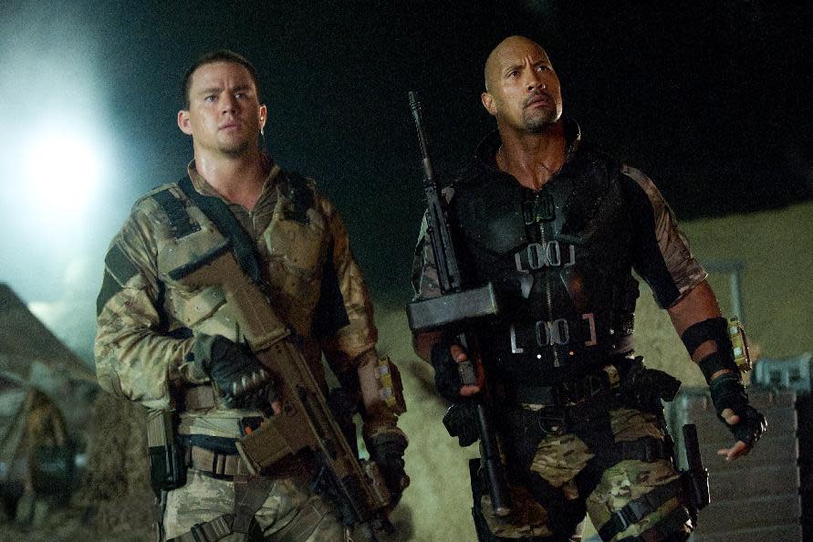 This film image released by Paramount Pictures shows Channing Tatum, left, and Dwayne Johnson in a scene from "G.I. Joe: Retaliation." (AP Photo/Paramount Pictures, Jaimie Trueblood)
