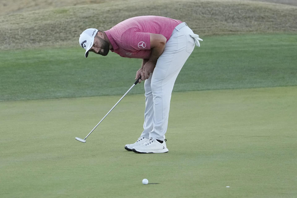 Jon Rahm reacts after missing a birdie putt on the 18th hole during the final round of the American Express golf tournament on the Pete Dye Stadium Course at PGA West Sunday, Jan. 22, 2023, in La Quinta, Calif. (AP Photo/Mark J. Terrill)