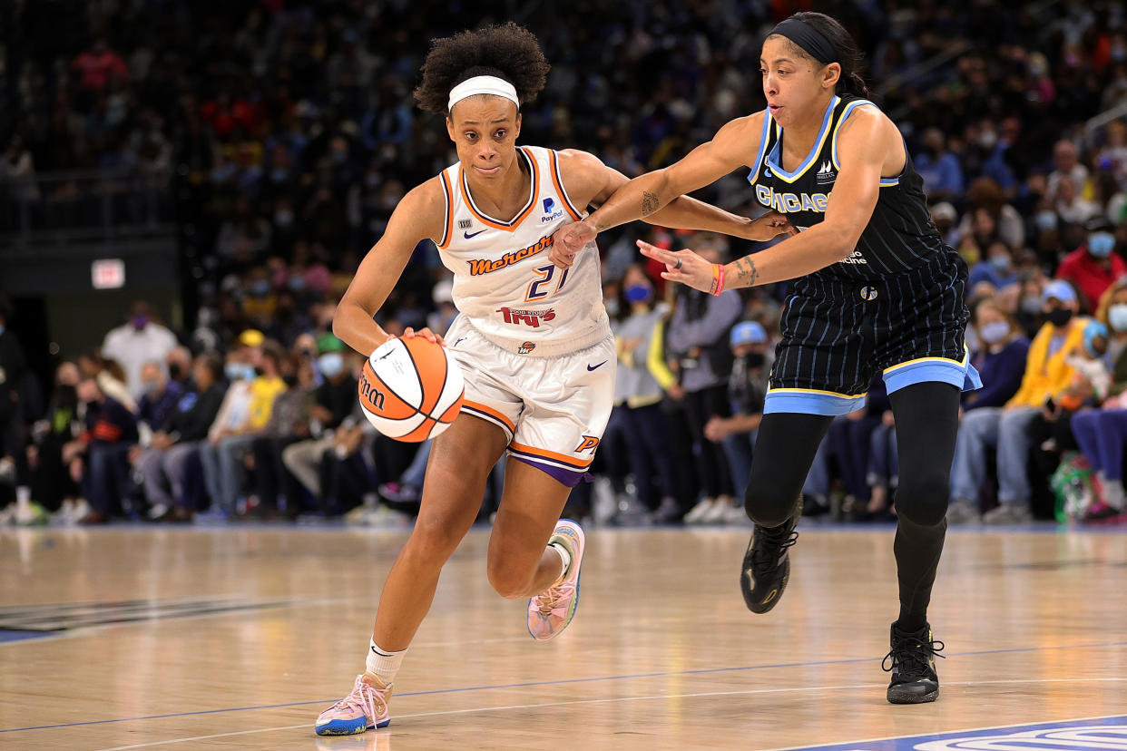 Candace Parker defends Brianna Turner who has the ball.