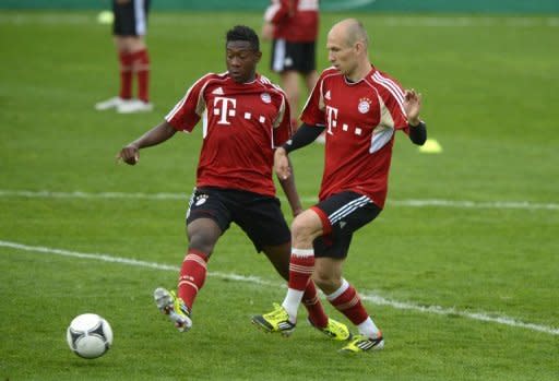 Bayern Munich's Arjen Robben (R) and David Alaba during a training session on May 11. Bayern are out to break their losing streak to German champions Borussia Dortmund in Saturday's domestic cup final as their Champions League showdown with Chelsea looms