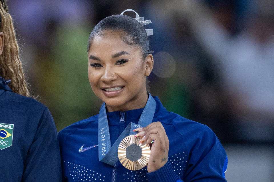 PARIS, FRANCE: AUGUST 5: Jordan Chiles of the United States stands on the podium with her bronze medal after the women's floor final during the Artistic Gymnastics competition at Bercy Arena during the Paris 2024 Summer Olympics on August 5, 2024 in Paris, France. (Photo by Tim Clayton/Corbis via Getty Images)