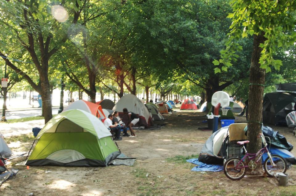 Camp Laykay Nou, a homeless encampment in Philadelphia. High and rising inequality is one reason the US rates badly on some international development rankings. <a href="https://www.gettyimages.com/detail/news-photo/camp-laykay-nou-celebrated-a-stay-in-the-city-of-news-photo/1227676000?adppopup=true" rel="nofollow noopener" target="_blank" data-ylk="slk:Cory Clark/NurPhoto via Getty Images;elm:context_link;itc:0;sec:content-canvas" class="link ">Cory Clark/NurPhoto via Getty Images</a>