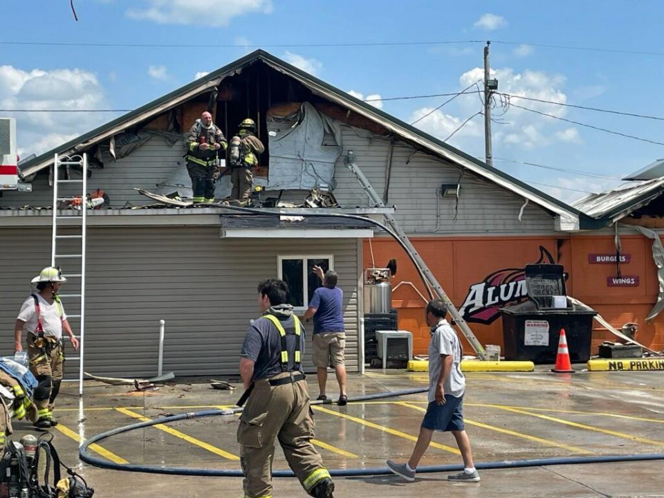 Thibodaux Volunteer firefighters respond to a fire Sunday afternoon that ripped through Alumni Grill along La. 1.