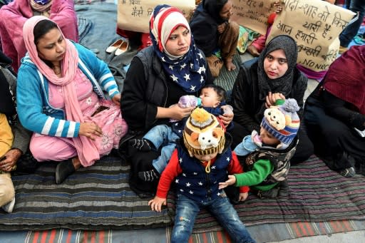 The protesters include grandmothers and younger women, many with toddlers in tow