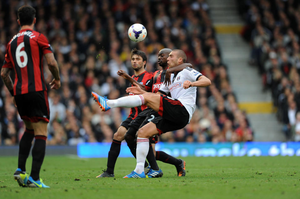 Fulham's Pajtim Kasami (Right) is challenged by West Bromwich Albion's Youssouf Mulumbu during the Barclays Premier League match at Craven Cottage, London.