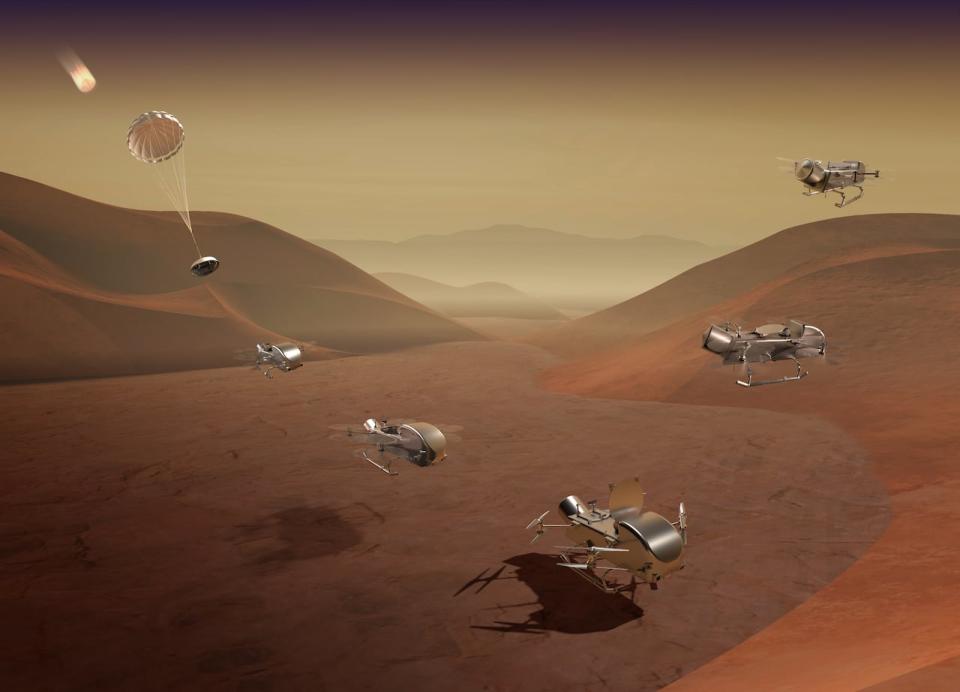 The Dragonfly helicopter lander, shown here in an artist's rendering of the mission concept, will land on Saturn's moon Titan and then make multiple flights to explore various locations as this characterizes the habitability of the ocean world.