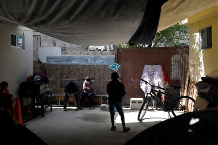 Migrants rest inside a shelter in Tijuana, Mexico April 6, 2019. Picture taken April 6, 2019. REUTERS/Carlos Jasso