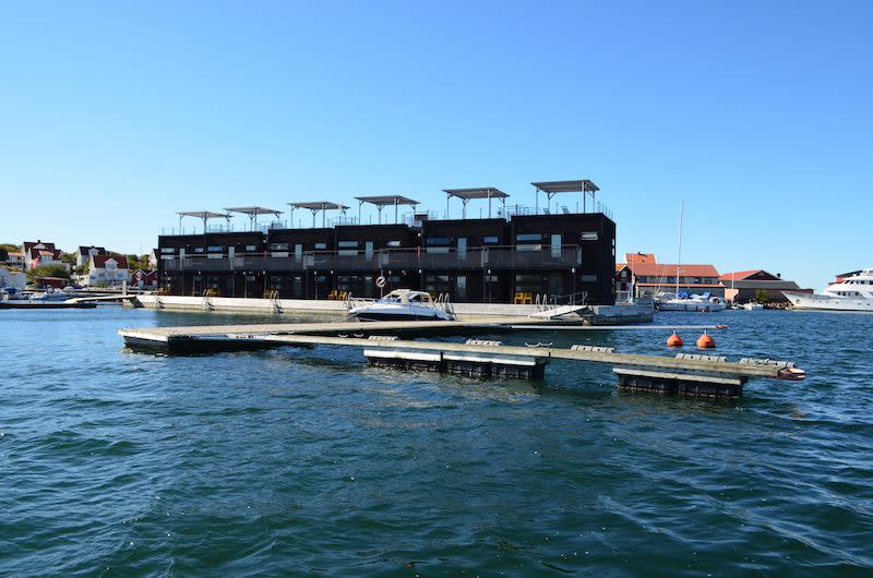 <p>Sweden's first floating hotel is not exactly a boat, but <a href="https://www.tripadvisor.com/Hotel_Review-g1953966-d2032154-Reviews-Salt_Sill-Kladesholmen_Vastra_Gotaland_County_West_Coast.html" rel="nofollow noopener" target="_blank" data-ylk="slk:Salt & Sill;elm:context_link;itc:0;sec:content-canvas" class="link ">Salt & Sill</a> is built upon pontoons off of the rocky Bohuslän Coast. The two-story dwelling has a spacious sundeck and adjacent boathouse lounge - and if you really insist on staying on a real boat, a two-story catamaran with a sauna is moored nearby and can be rented overnight. </p>