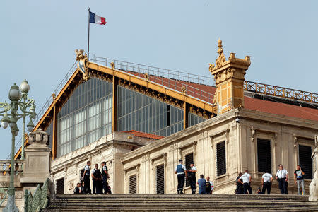 Police secure the area outside the Saint-Charles train station after French soldiers shot an killed a man after he stabbed two women to death at the main train station in Marseille, France, October 1, 2017. REUTERS/Jean-Paul Pelissier